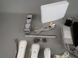a lot of electronic items that are sitting on a table
