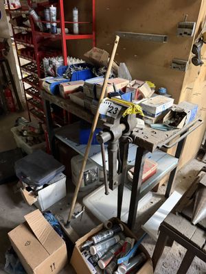 a garage with a lot of tools on the shelves
