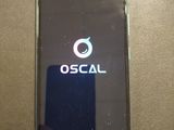 an image of a cell phone with the logo of oscal on it