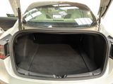 a trunk of a car with the back door open
