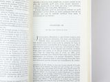 an open book that is sitting on a table