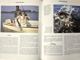 a book with a picture of a man and a woman on a boat with a fish