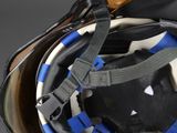 a helmet that has a blue and white stripe on it