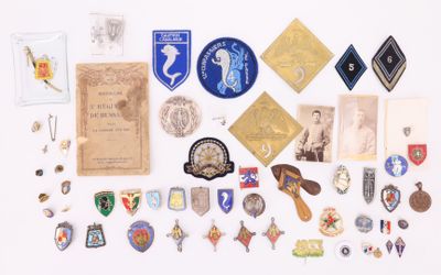 many different types of badges on a white surface