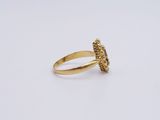an image of a gold ring on a white background