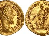 a gold coin with an image of a woman on it
