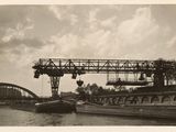 a black and white photo of a boat in the water
