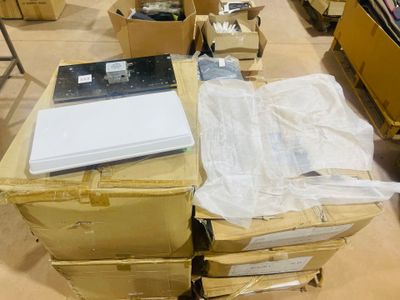 a pile of boxes with a laptop on top of it