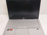 a laptop computer that is sitting on a table