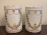 two tins that are sitting on a table