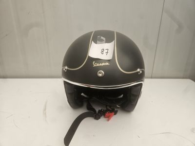 an image of a helmet with a tag on it sitting on a table