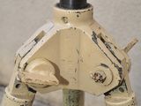 a small tripod with a camera on top of it
