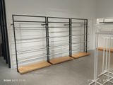 a room with a bunch of shelves that are on the wall
