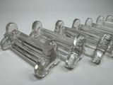 a lot of glass pipes sitting on a table