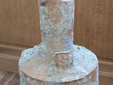 a vase that is sitting on a wooden floor