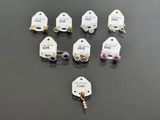 a group of small tags with a price tag attached to them