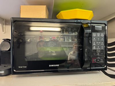 a microwave that is sitting on top of a counter