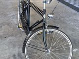 a bicycle that is parked in a garage
