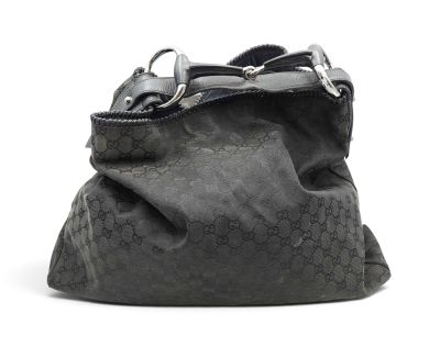 an image of a guccissi bag on a white background