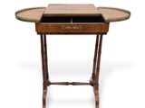 a small table with a drawer on top of it