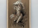dessin représentant une femme nue en train de lire un livre, dans un cadre en bois