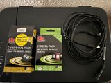 a black box with a black cable and a black box with a black cable and a black box with a black box with a black box and a yellow