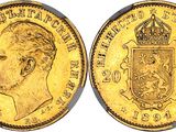 a gold sovereign coin with a crown on top of it