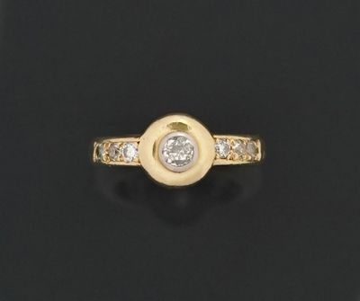 Bague en or jaune 18K 750 millièmes ornée d'un diamant de ta…