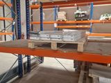 warehouse racking with pallets and boxes in a warehouse