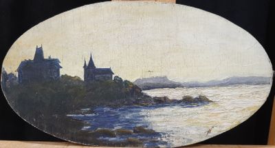 une image représentant un tableau d'un château posé sur une table en bois