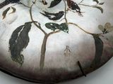 a picture of a decorative plate with birds on it