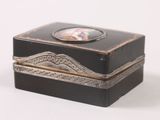 a small black box with a picture on top of it