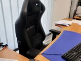 a computer desk with a keyboard and mouse on it