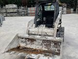 a bulldozer that is parked in a lot