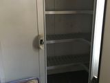 an image of an open refrigerator in a kitchen