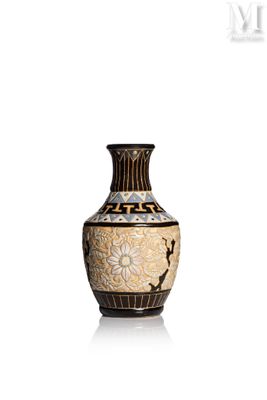 a vase that is sitting on a white surface