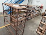 many shelves that have shoes on them in a warehouse