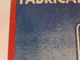 a sign on the wall that says fabricator