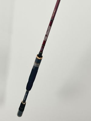 a close up of a fishing rod on a white background