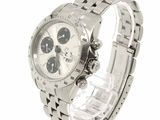 rolex watch with white dial and silver bracelet on a white background