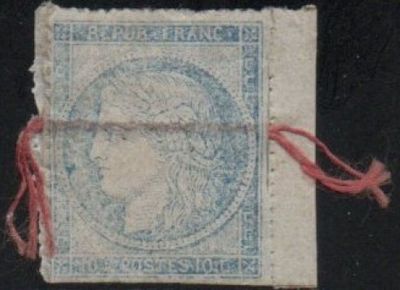 an old stamp with a picture of a woman on it