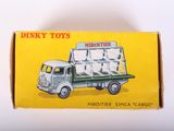 a box with a toy truck inside of it