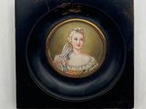 painting of a woman with a veil in a black frame