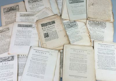 a pile of old books sitting on a table
