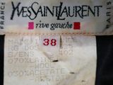 a label on a black shirt that says vegan laurent