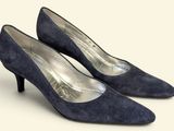 pair of women ' s blue sued shoes on a white background