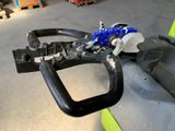 a close up of a fork and handle on a forklift