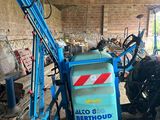 a tractor that is parked in a garage