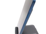 a cell phone that is sitting on a stand
