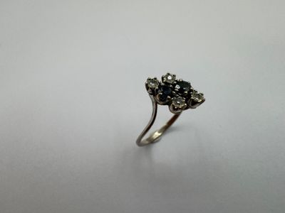 Bague en or gris 18 carats (750 millièmes), orné e de 4 diam… - Photo 1